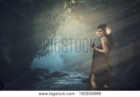 Asian sexy women bathing at creek in Thailand