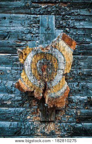 Old wooden target for throwing ax