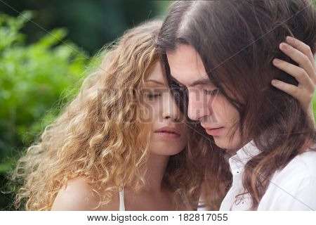 Romantic Young couple in love at nature