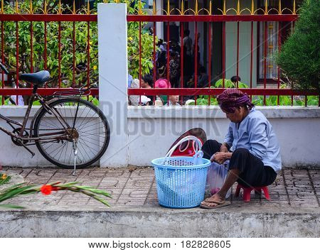 Vendor On Street In Saigon, Vietnam