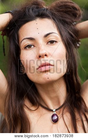 Porrait of beautiful hippie girl. Summer time