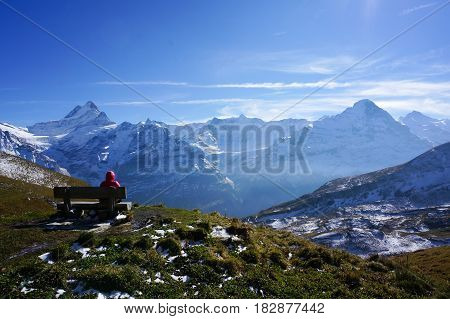 man relax resting on seating climbing the snow moutain with blue sky