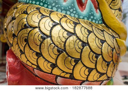 Close up of thai chinese dragon oriental art in temple shrine