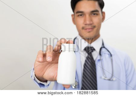 Doctor, Physician Holding Drug In Hand At Workplace. Anacea, Life Save Service, Prescribe Medicine,