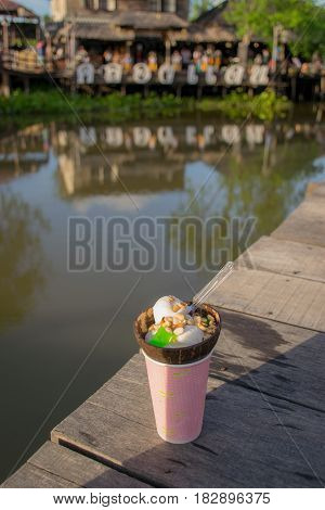 Ice cream in coconut shell
 Klong Dan floating market Ranot District, Songkhla Province, Thailand