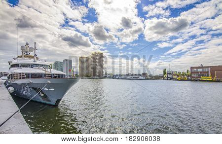 Antwerp Harbor. Yacht on the background of houses. Belgium.