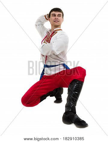 young man wearing a folk costume posing against isolated white background with copyspace