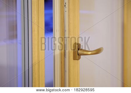 Detail of window handle on wooden window