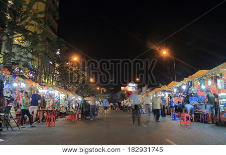 HO CHI MINH CITY VIETNAM - NOVEMBER 25, 2016: Unidentified people visit Ben Thanh night market.