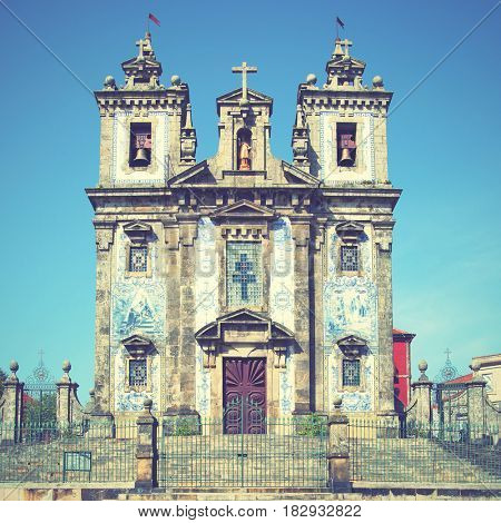 Santo Ildefonso church in Porto, Portugal. Retro style filtered image