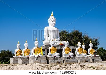 a lot of White Buddha with blue sky background