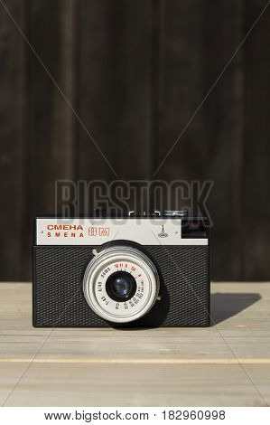 Borotin, Czech Republic - March 25: Smena 8M Old Vintage Filtered Camera On Wooden Background On Mar