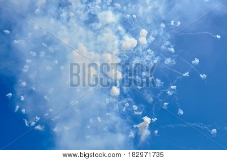 blue sky with fireworks firecrackers and smoke in day time Ischia Italy