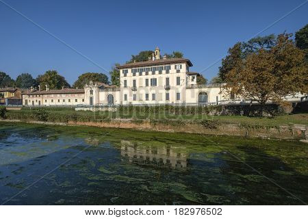 Cassinetta di Lugagnano (Milan Lombardy Italy): facade of the historic Villa Visconti Maineri along the canal known as Naviglio Grande of Turbigo