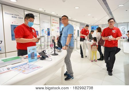 HONG KONG - CIRCA NOVEMBER, 2016: people at SmarTone shop. SmarTone Telecommunications Holdings Limited is a wireless communications carrier with operating subsidiaries in Hong Kong and Macau.
