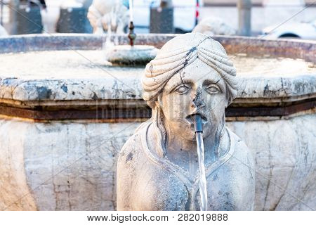 Sculpture Of Cantarini Fountain At Piazza Veccia Square Of Medieval Town Of Bergamo In The Evening. 