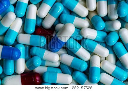Pile Of Antibiotic Capsule Pills. Antibiotics Drug Resistance. Drug Use With Reasonable. Global Heal