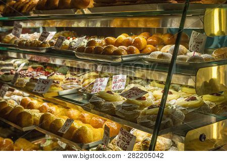 Naples, Italy - October 31, 2015: Showcase Street Shop With Sweets And Desserts In The Center Of Nap