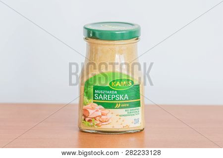 Pruszcz Gdanski, Poland - February 4, 2019: 2019: Kamis Sarepska Mustard In A Glass Jar On Wooden Ta