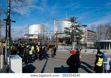 Strasbourg, France - Feb 02, 2018: People Demonstrating Walking In Front Of European Court Of Human 