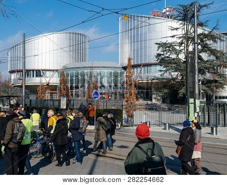 Strasbourg, France - Feb 02, 2018: People Demonstrating Walking In Front Of European Court Of Human 