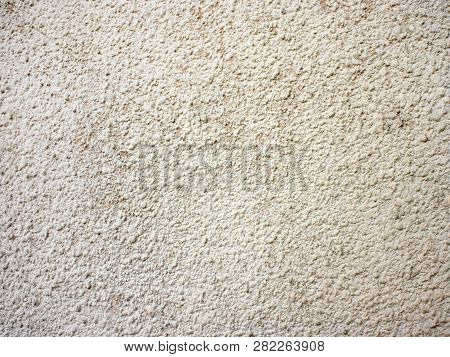 Light Beige Cement Wall Covered With Decorative Plaster