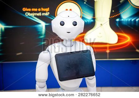Prague, Czech Republic - 01.02.2019: The Robot Consultant With Digital Tablet In Prague Airport In C
