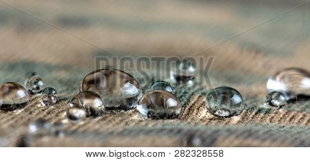 Water Droplets On Moisture Resistant Fabric Close Up