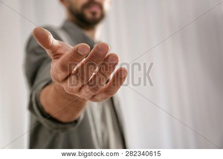 Man Giving Hand To Somebody, Closeup With Space For Text. Help And Support Concept
