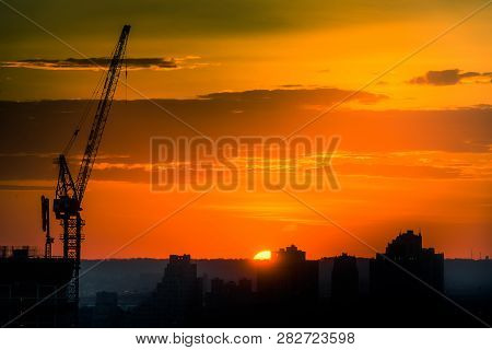 Siluate Of Tower Cane Building On High Construction , Jersey City, Nj
