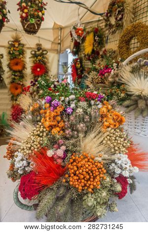 Colorful Flowery Decorations For Sale From A Street Stand During The Annual Festival In Jawor, Polan
