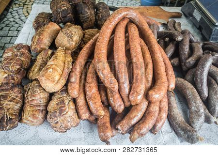 Delicious Meat And Blood Sausages Sale From A Street Stand During The Annual Bread And Gingerbread F