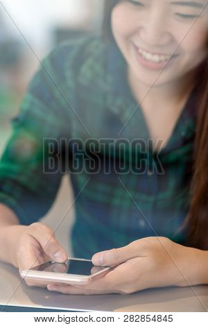 Closeup Asian Businesswoman Hand Using The Smart Mobile Phone With Happiness Action On The Desk Besi