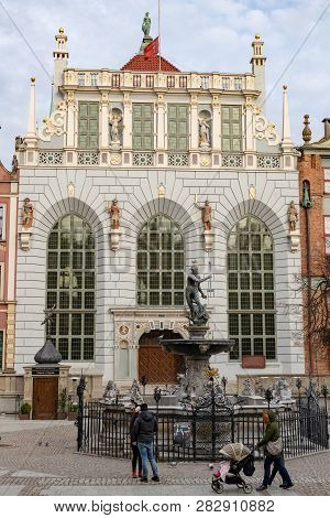 Gdansk, Pomeranian / Poland - February, 07, 2019: Walking People On The Market Near Neptune. Market
