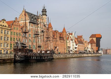 Gdansk, Pomorskie / Poland - February, 07, 2019: Długie, Seashore On The Motława River. Tenement Hou