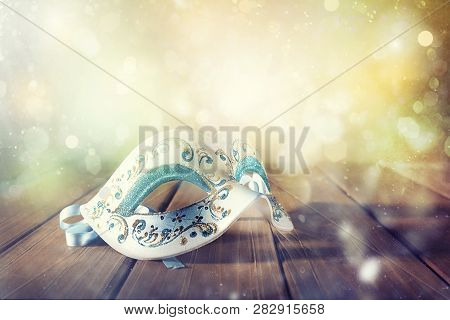Stll Life Of A Carnival Mask On A Wood Floor