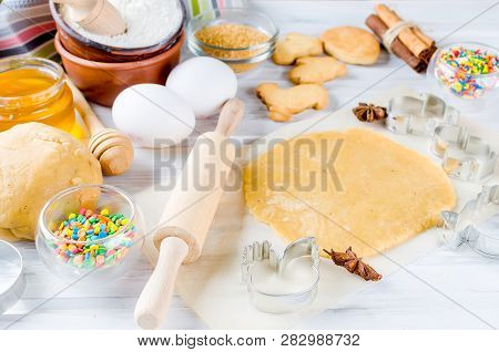 Easter Cooking Background, Dough And Indredients, Cuts For Cookies And Colored Sugar Décor For Bakin