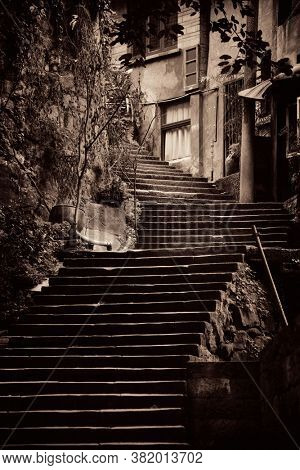 Stairs and tree in Xiahao Old street in Chongqing, China.