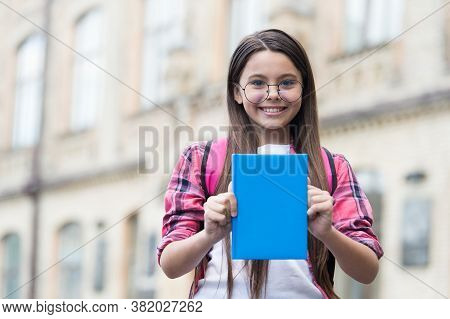 Book Is Just Waiting For You. Happy Child Show Book Cover. School Library. Literature Lesson. Readin