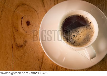 Hot Americano Coffee With A Little Foam And Smoke