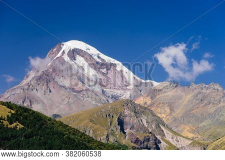 Mount Kazbegi Is A Popular Natural Attraction And Stepantsminda (kazbegi) Village, Georgia