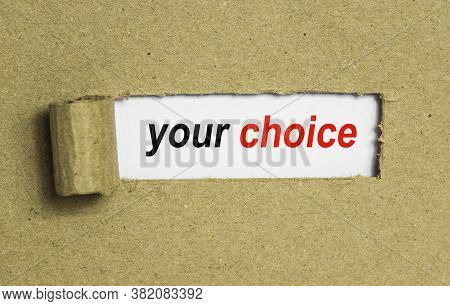 The Text Your Choice Behind Torn Brown Paper