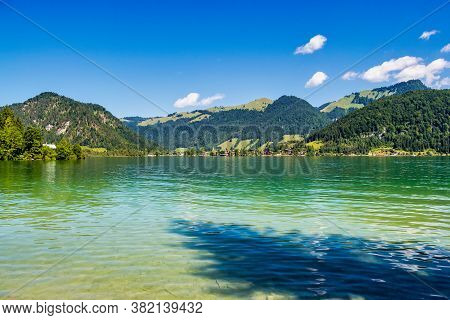 Lake Walchsee Near Koessen At The Wilder And Zahmer Kaiser In Tirol, Austria.
