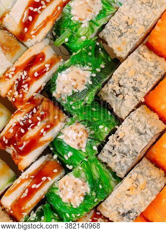 Many Types Of Shusha Are Stacked In A Row.