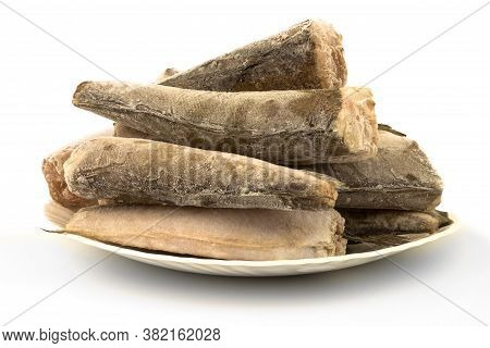 Frozen Raw Fish Hake, Pollock On The Plate Isolated On White Background.