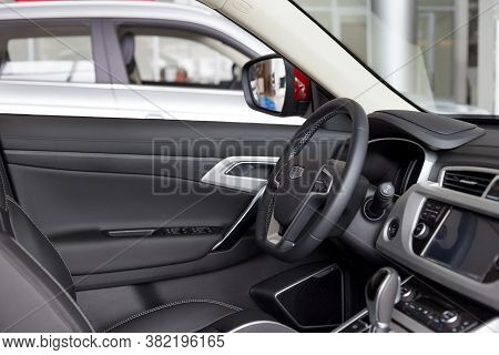 Russia, Izhevsk - August 14, 2020: Geely Showroom. Interior Of New Modern Car Geely Atlas With Autom