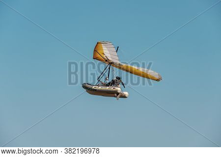 Saint Florent, Corsica, France - 22nd August 2020: A Rigid Inflatable Flying Boat Soars Above The Ba
