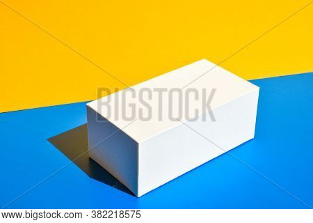 White Box. Drugs Box Mock-up. Mockup. Copy Space. Yellow And Blue Creative Minimalism Isometric Back