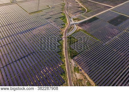 Aerial View Of The Solar Panel In Solar Farm For Green Energy