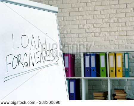 Loan Forgiveness Inscription On The White Board In The Office.